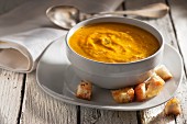 Indian pumpkins and carrot soup with croutons