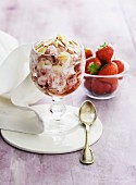 Strawberry and quark dessert with almonds