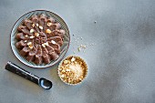 Chocolate semolina pudding with flaked almonds