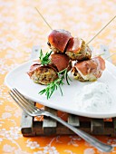 Meatballs with rosemary wrapped in ham