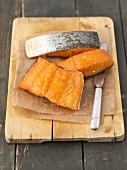 Hot-smoked salmon on a chopping board