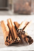 Cinnamon sticks on a wooden surface