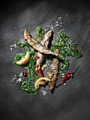 Grilled sardines with seaweed, lemons, chilli and sea salt