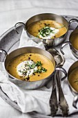 Red lentil soup with sour cream and herbs