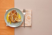 French toast with mango and coconut chips