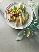 Oven-roasted asparagus with breadcrumb hash and green Hollandaise sauce
