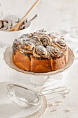 A poppyseed bun cake with icing sugar