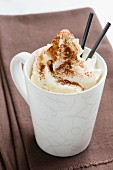 Viennese coffee with cream and cocoa powder