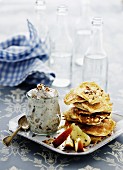 Mini pancakes with apple and nut cream