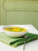Carrot soup with pea and chervil pesto