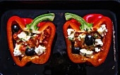 A pepper filled with olives and feta cheese (seen from above)