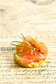 Salmon canapes with sesame seeds and dill