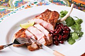 Grilled pork with kidney beans and coriander (Mexico)