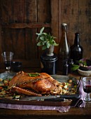 Crispy roast goose with a pear and bread stuffing