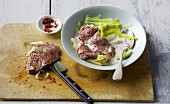 Poached beef fillet on a a leek medley with cream cheese