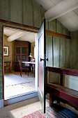 Foyer with open door and view of study