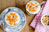 Peach quark with flaked almonds