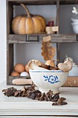 Mushrooms and onions in blue and white painted bowl