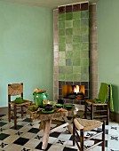 Stockpot on wooden table in front of open fireplace