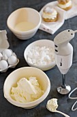 Ingredients for meringues and a mixer