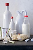 Ceramic bottles, olive oil, milk bottles, pasta and garlic