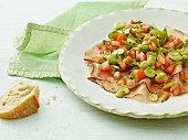 Marinated broad beans with bacon