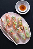 Vegetable-filled spring rolls with spicy chilli sauce