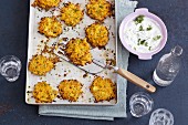 Quinoa fritters with carrots and coriander sour cream
