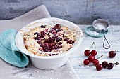 Millet bake with almonds and sour cherries
