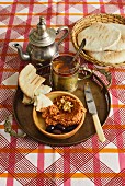 Muhammara (a Turkish dip made from pointed peppers, melba toast, walnuts and pul bibber)