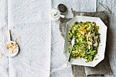 Broccoli and couscous with lemon yoghurt and flaked almonds