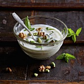 Mint yoghurt with walnuts and pistachios