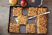Apple cake topped with oats and nuts