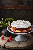 Apple cake with raspberries and a meringue topping