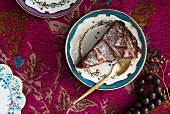 A slice of chocolate cake (seen from above)