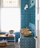 Bathroom with Moroccan tiles and simple wash basins