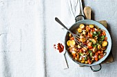 Fried Spanish potatoes with peppers and chilli peppers