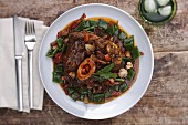 Osso buco with green beans and mushrooms