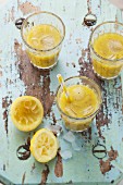 Vitamin smoothies made from kiwis, oranges and mandarins