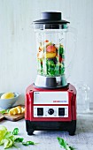 Fresh ingredients for smoothie in a blender