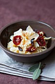 Farfalle with dried tomatoes, olives and Parmesan