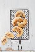 Poppy seed crescent rolls on a wire rack