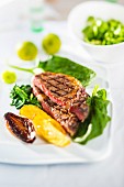 Beef steak with spinach