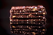 A stack of chocolate and hazelnut slices