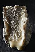 A slice of Selles sur Cher (goat's cheese, France)