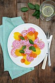 Turnip salad with golden beets, chioggia beets and carrots (seen from above)