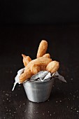 Churros (traditional Spanish and Mexican choux pastry) with cinnamon sugar