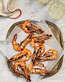 Grilled prawns on parchment paper