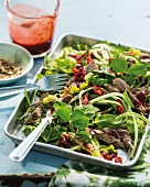 Fried duck salad with cucumber strips (China)