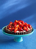 Chocolate tart topped with strawberries